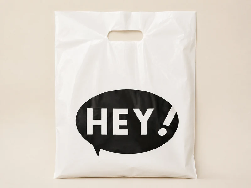 ถุงหิ้วพลาสติก PE สีขาวแบบหูเจาะ พิมพ์โลโก้ HEY! สีดำ